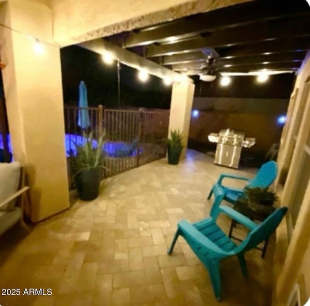 view of patio / terrace with a pergola and a ceiling fan