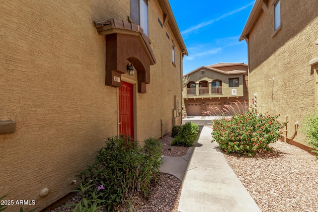 2250 E Deer Valley Rd Unit 26, Phoenix, AZ 85024 - property entrance featuring stucco siding and a balcony