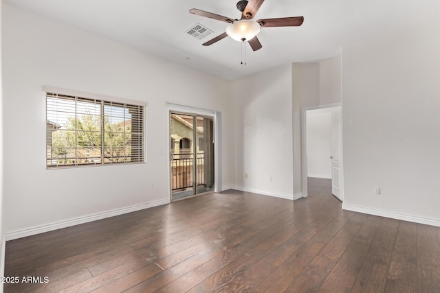 2250 E Deer Valley Rd Unit 26, Phoenix, AZ 85024 - unfurnished room featuring ceiling fan, dark wood finished floors, and baseboards