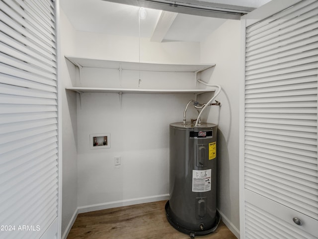 utility room featuring water heater