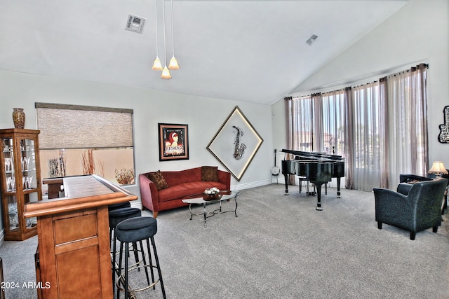 living room with lofted ceiling, carpet flooring, baseboards, and visible vents