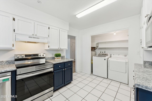 kitchen featuring appliances with stainless steel finishes, under cabinet range hood, blue cabinetry, separate washer and dryer, and white cabinetry
