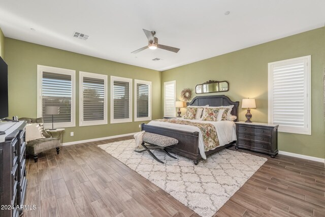 bedroom featuring ceiling fan and wood-type flooring