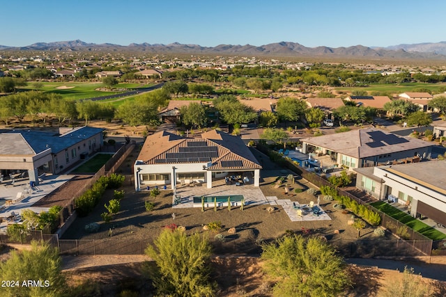 birds eye view of property featuring a mountain view