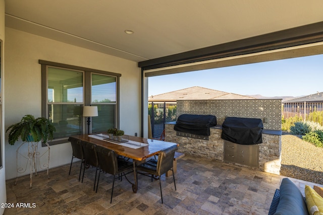 view of patio / terrace featuring grilling area and exterior kitchen