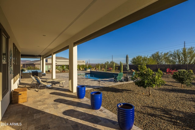 view of patio / terrace with outdoor lounge area and a fenced in pool