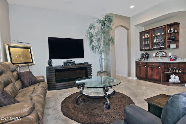 living room featuring indoor bar