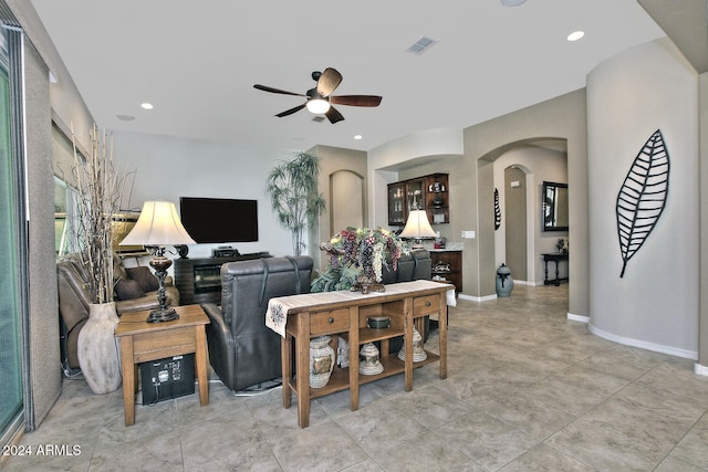 living room featuring ceiling fan