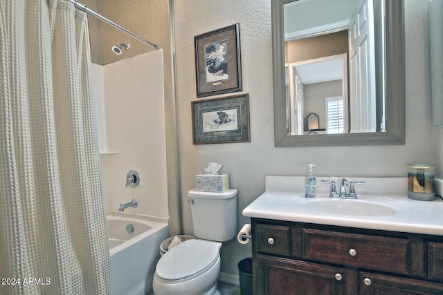 full bathroom featuring shower / bathtub combination with curtain, vanity, and toilet