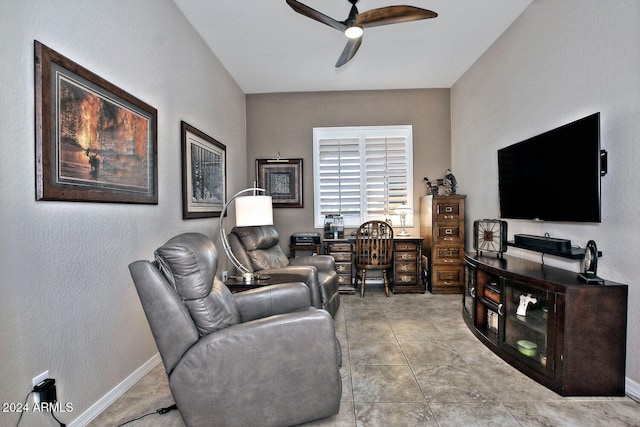 tiled living room featuring ceiling fan