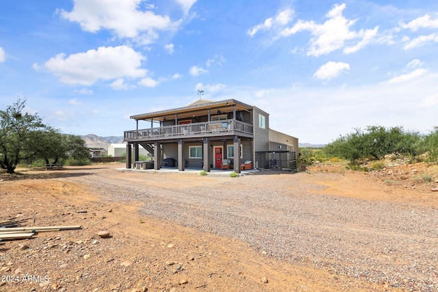 view of front of home featuring a mountain view