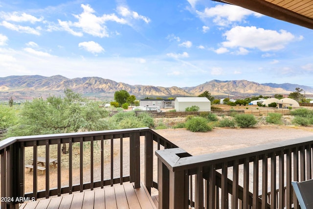 wooden terrace with a mountain view