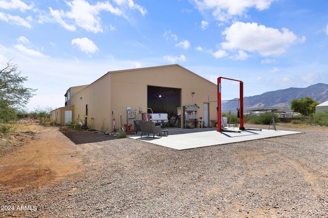 view of outdoor structure featuring a mountain view