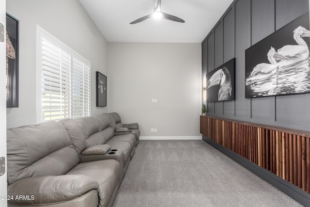 living room featuring carpet floors and ceiling fan