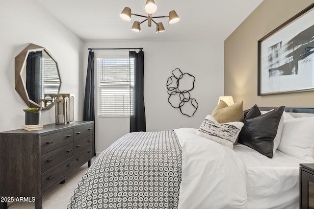 bedroom featuring a chandelier