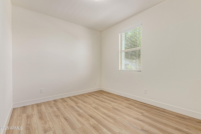 22876 E Via Del Sol, Queen Creek, AZ 85142 - unfurnished room with light wood-type flooring and baseboards