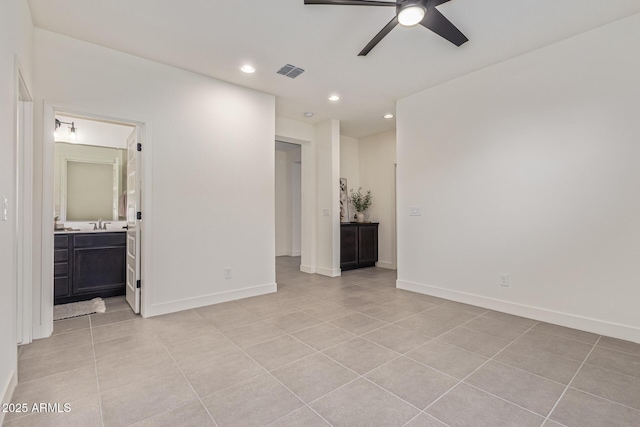 22876 E Via Del Sol, Queen Creek, AZ 85142 - spare room with light tile patterned floors, a ceiling fan, recessed lighting, and baseboards