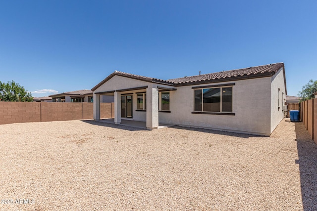22876 E Via Del Sol, Queen Creek, AZ 85142 - rear view of house with a fenced backyard, stucco siding, a tile roof, and a patio