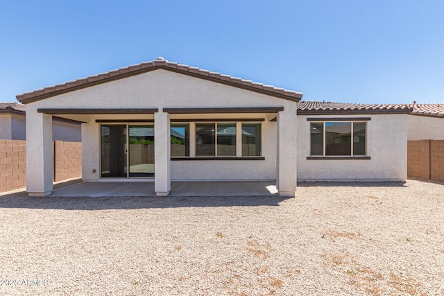 22876 E Via Del Sol, Queen Creek, AZ 85142 - back of house with fence, a patio, a tile roof, and stucco siding