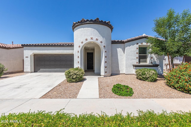 22876 E Via Del Sol, Queen Creek, AZ 85142 - mediterranean / spanish house with stucco siding, an attached garage, a tile roof, and driveway