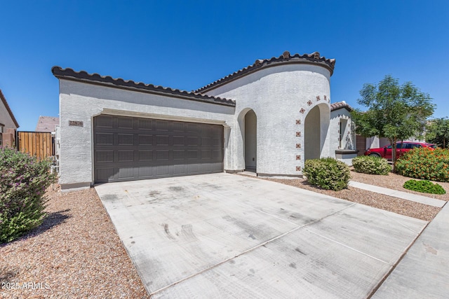 22876 E Via Del Sol, Queen Creek, AZ 85142 - mediterranean / spanish-style house featuring driveway, stucco siding, a garage, and a tile roof