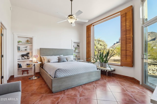 bedroom featuring ceiling fan, access to outside, and tile patterned floors