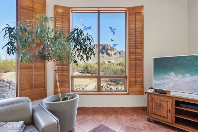 sitting room featuring light tile patterned floors