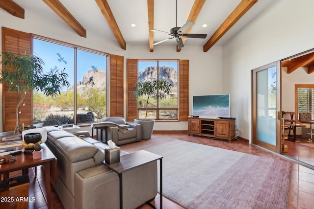 living room featuring ceiling fan, tile patterned flooring, and beam ceiling