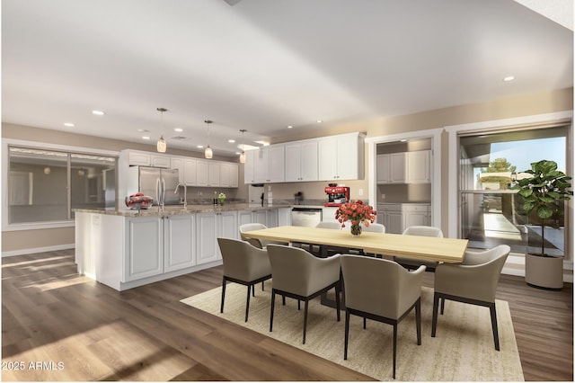 dining area featuring recessed lighting and dark wood-style flooring