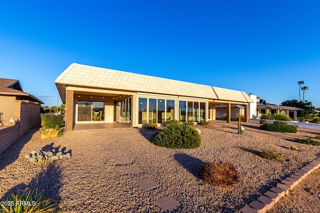 back of house featuring a patio