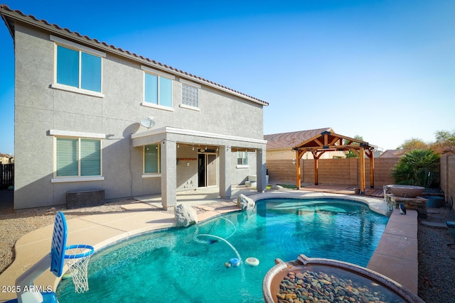 view of swimming pool with a patio, a gazebo, a fenced backyard, and a fenced in pool