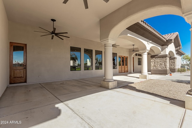 view of patio featuring ceiling fan