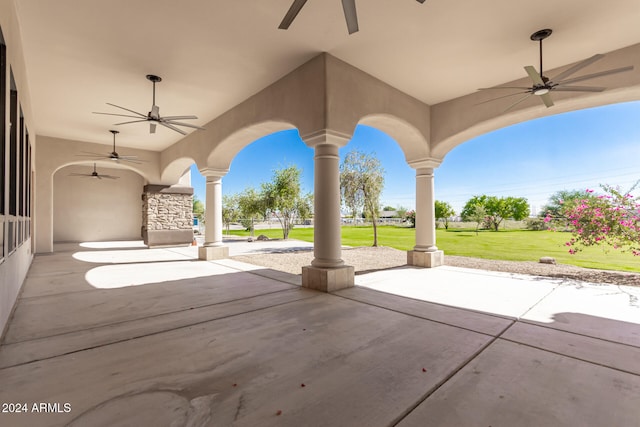 view of patio featuring ceiling fan