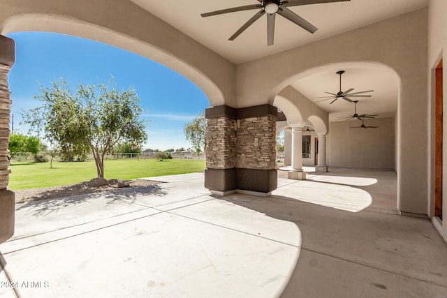 view of patio / terrace featuring ceiling fan