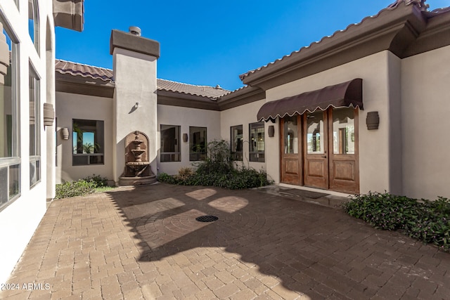 view of patio featuring french doors