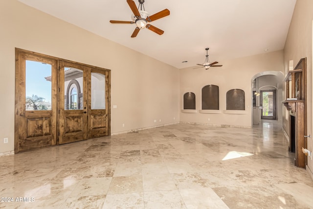 foyer featuring ceiling fan