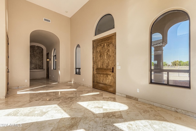 interior space featuring high vaulted ceiling