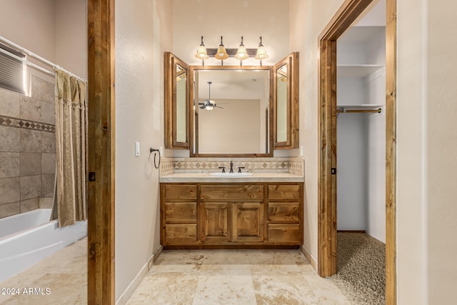 bathroom featuring vanity, ceiling fan, and shower / bathtub combination with curtain