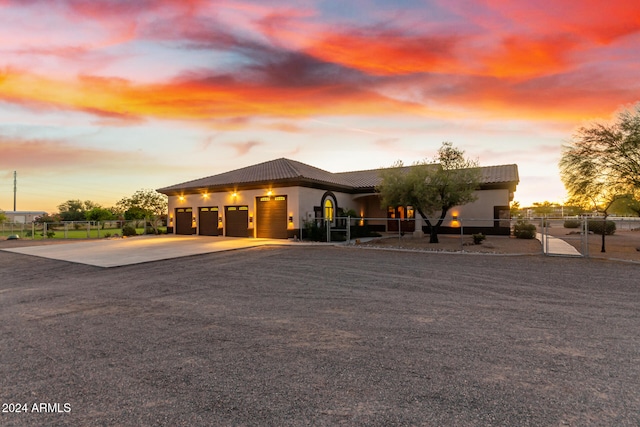 view of front of property featuring a garage