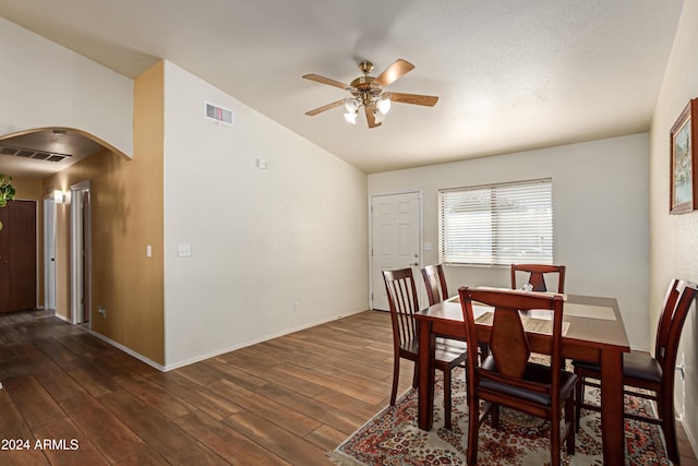 dining space featuring ceiling fan and dark hardwood / wood-style flooring