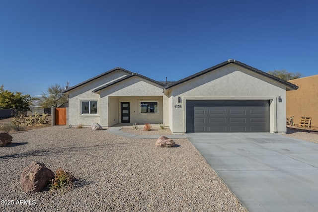 single story home featuring a garage