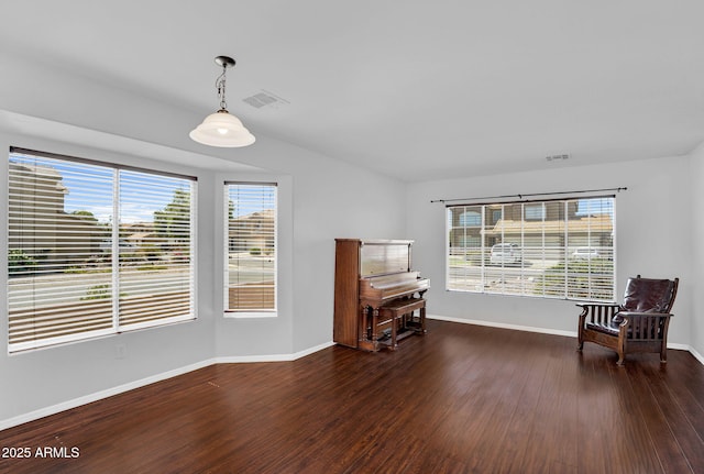 941 E Stirrup Ln, San Tan Valley, AZ 85143 - living area featuring wood finished floors and healthy amount of natural light