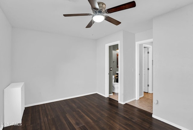941 E Stirrup Ln, San Tan Valley, AZ 85143 - empty room with wood finished floors and a ceiling fan