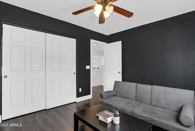 941 E Stirrup Ln, San Tan Valley, AZ 85143 - living room featuring a ceiling fan and dark wood-type flooring