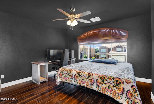 941 E Stirrup Ln, San Tan Valley, AZ 85143 - bedroom featuring wood finished floors, a ceiling fan, and a textured wall