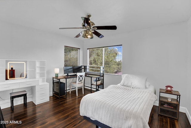 941 E Stirrup Ln, San Tan Valley, AZ 85143 - bedroom with wood finished floors, a desk, and a ceiling fan