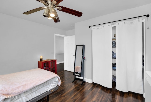 941 E Stirrup Ln, San Tan Valley, AZ 85143 - bedroom with wood finished floors, ceiling fan, and a closet