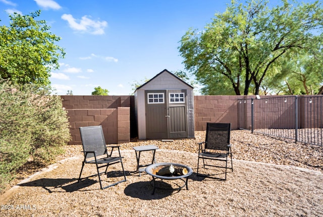 941 E Stirrup Ln, San Tan Valley, AZ 85143 - fenced backyard featuring an outdoor fire pit and a shed