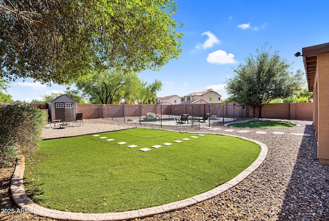 941 E Stirrup Ln, San Tan Valley, AZ 85143 - fenced backyard featuring a patio and a storage unit