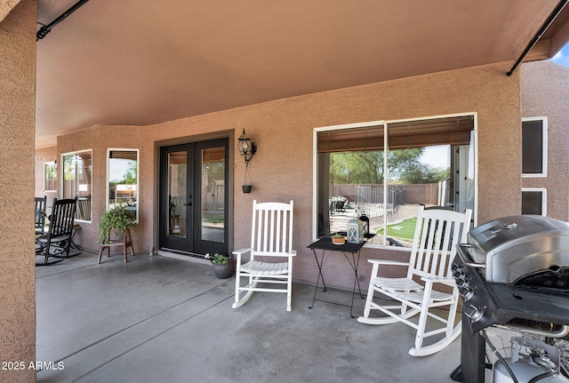 941 E Stirrup Ln, San Tan Valley, AZ 85143 - view of patio / terrace featuring french doors and grilling area